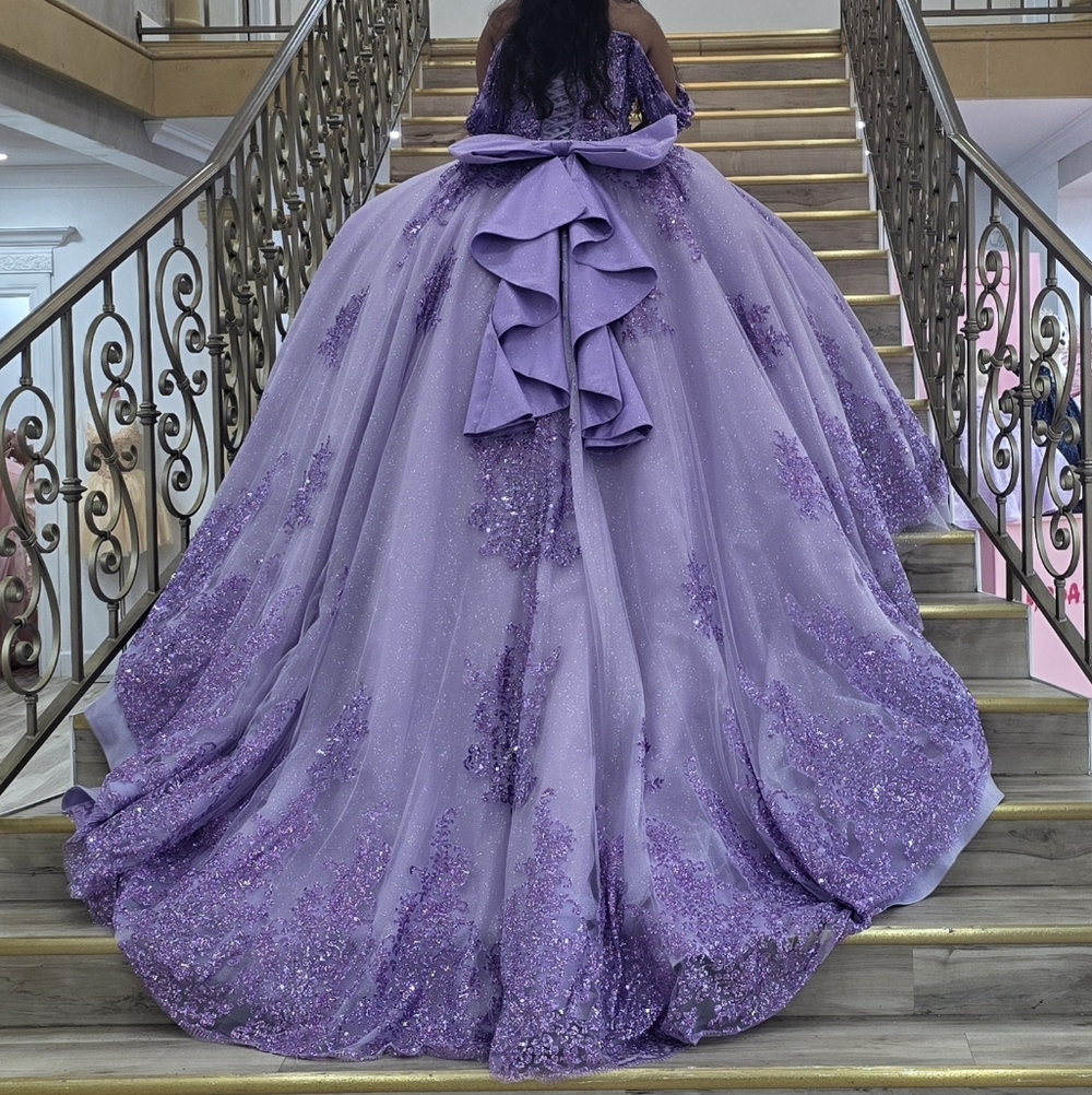Elegant Purple Quinceanera Dress with Bow Accent